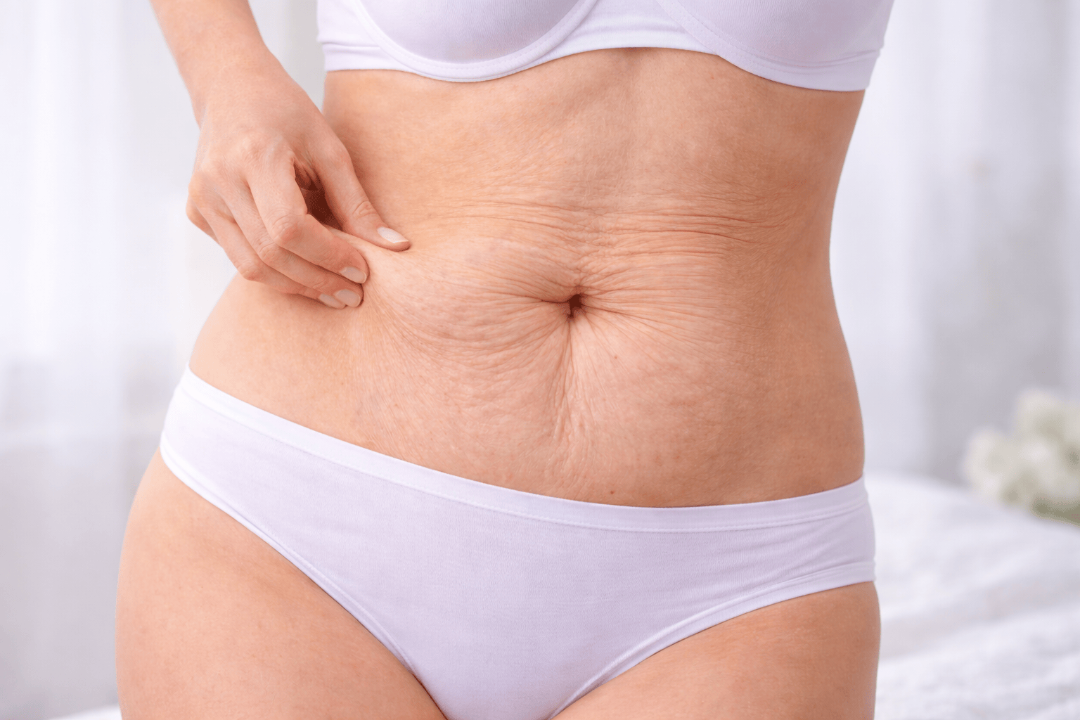 Живот после родов: причины, последствия и способы восстановления